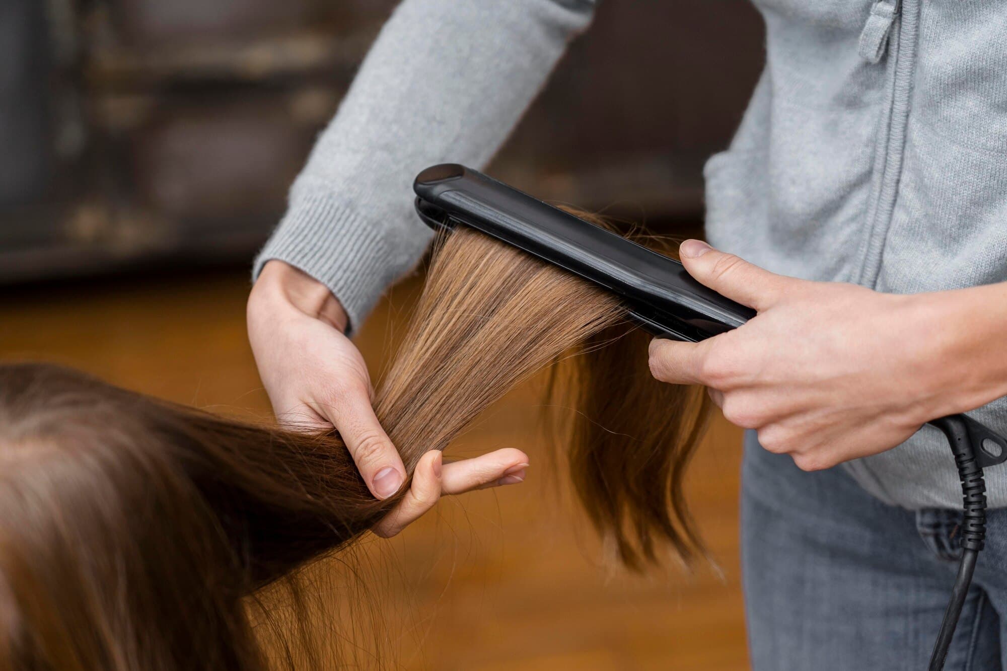 Discover Smooth Perfection with Hair Straightening Services
